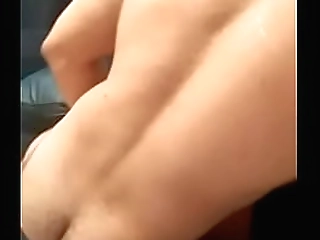 blonde shemale masturbates her massive cock in rubber gloves