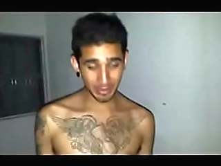 feminine t-girl pulls out long shemale shaft and big balls