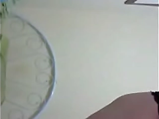 crossdresser playing with dildo