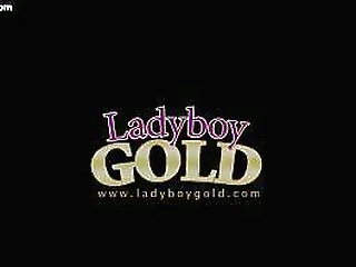 ebony shemale sucks a dildo and masturbating