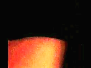 amateur crossdresser in chastity device plays with huge dildo