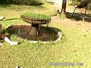 cute shemale blowing a cock outside